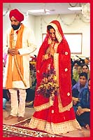 Before the commencement of marriage ceremony (Anand Karaj) the Sikh prayer (Ardas) being performed in the presence of the Holy Sri Guru Granth Sahib